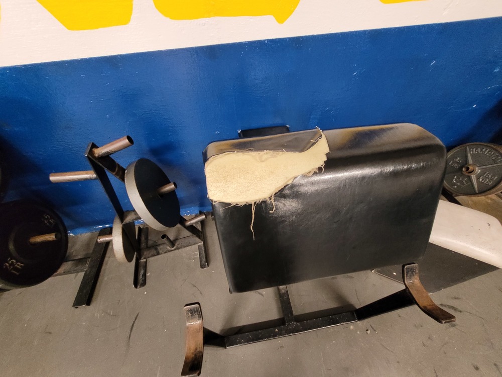 Torn weight bench
