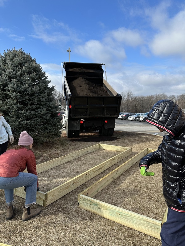 Loading the boxes with dirt